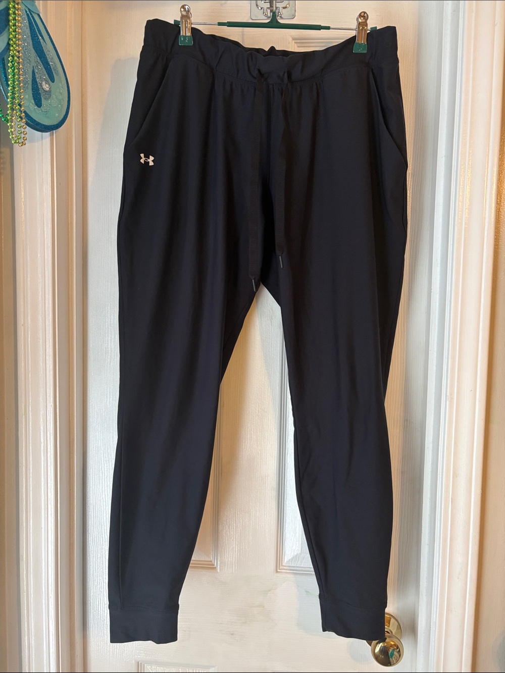 Under Armour women’s mid rise black joggers size medium.